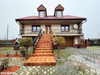 Samowystarczalny dom z ogrodem i stawem