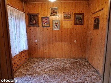 Atrakcyjny dom na 12 arowej działce - właśnie dla Ciebie.