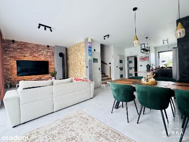 Nowoczesny dom w zabudowie szeregowej z ogrodem