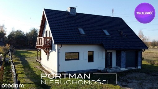 Atrakcyjny dom na dużej i kształtnej działce.