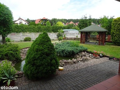 Zadbany dom z ładnie zagospodarowaną działką!