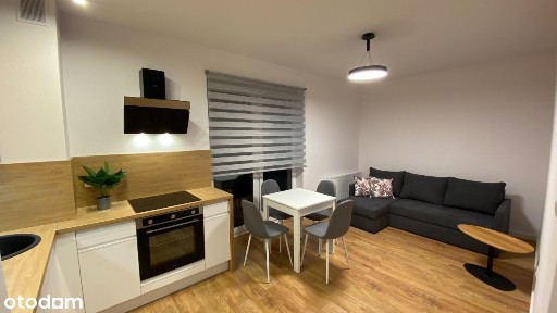 2 pokoje z miejscem w hali garażowej