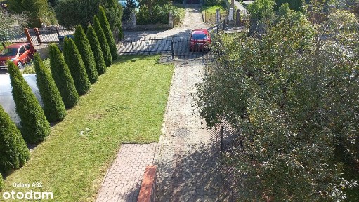 Dom z garażem, ogrodem i poddaszem - 459.000 PLN