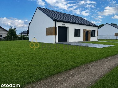 Nowoczesny dom parterowy z garażem | Gronów | 115