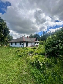 Udział 1/2 w nieruchomości zabudowanej i niezabudowanej