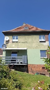 Połowa domu z ogródkiem