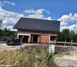 Dom 154 m2, działak 6,5 ar, stan surowy otwarty, prąd, woda, kan