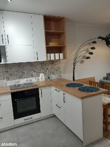 2 - pokoje mieszkanie z ogródkiem i zewnętrznym miejscem postojowym.