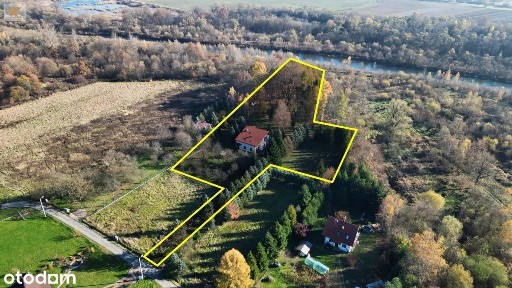 Dom z ogrodzoną działką, prywatnym lasem i tarasem - Niezdów