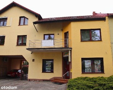 Budynek mieszkalno-usługowy z ogrodem i garażem