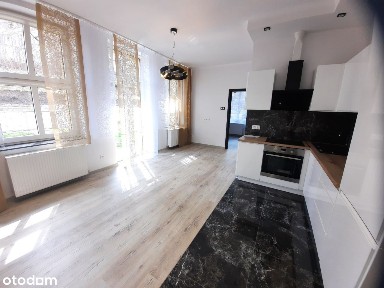 Nowe mieszkanie z ogrodem na wynajem