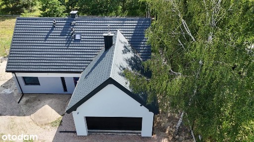 Nowy do własnej aranżacji parterowy dom z poddaszem użytkowym garażem