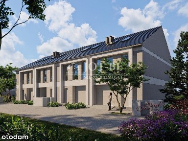 Skrajny szereg z dali od drogi.