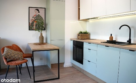 Nowoczesna kawalerka z własnym miejscem parkingowym w Centrum