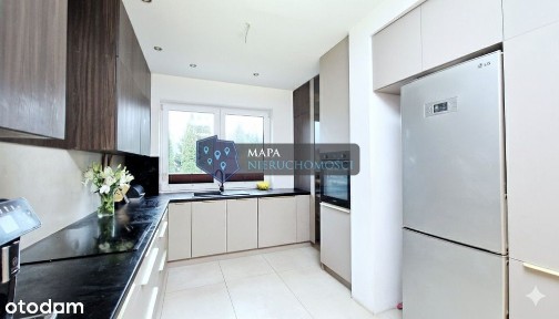 Idealny dom z pompą ciepła w magicznym krajobrazie