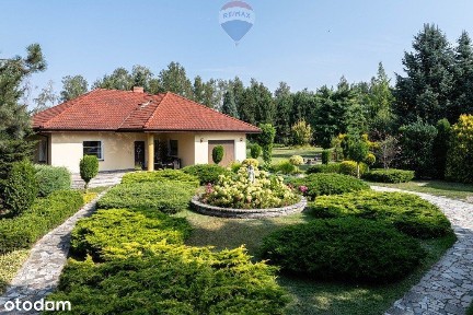 Parterowy, przepiękny, duży ogród z drugim domkiem