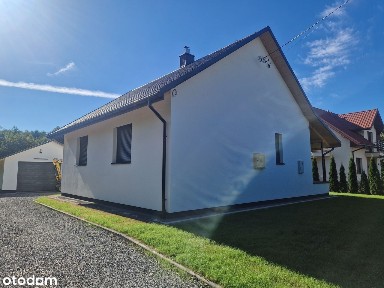 Dwukondygnacyjny dom z garażem i ogrodem