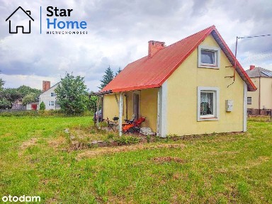 Przytulny dom z użytkowym poddaszem i ogrodem