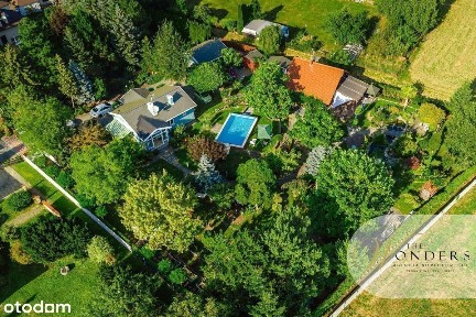 Posiadłość z 2 domami, basenem i enklawą zieleni