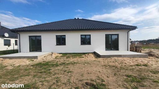 Nowoczesny dom w zabudowie bliźniaczej. Astrowa.