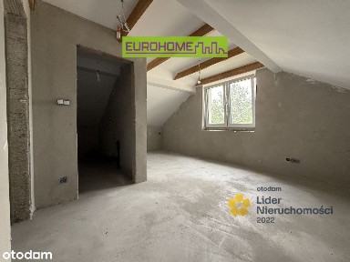 Nowoczesny dom parterowy z antresolą - Trześń