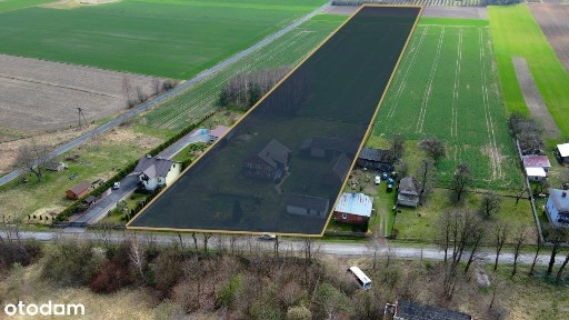 Dom na bardzo dużej działce pod stadninę.