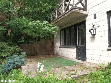 Dom w zabudowie segmentowej z warsztatem, pod DG