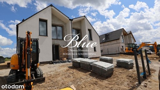 Dom w zabudowie bliźniaczej w otoczeniu natury