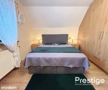 Dom wolnostojący z ogrodem i garażem