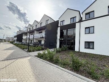 Nowoczesne 2-pokojowe mieszkanie z tarasem + 2 miejsca postojowe.