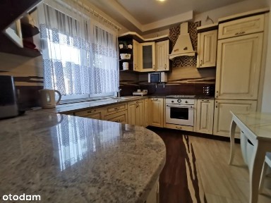 Przestronne mieszkanie 104 m² z ogródkiem i garażem