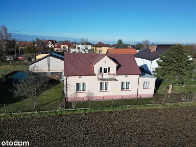 Budynek mieszkalny wraz zabudowaniami gospodarczymi