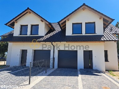 Dom w zabudowie bliźniaczej z garażem