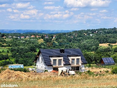 Dom w zabudowie bliźniczej dla rodziny
