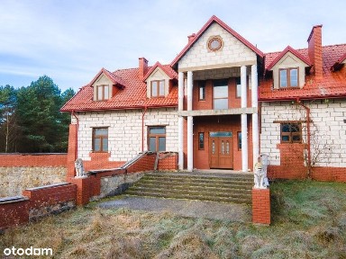 Duży dom nad jeziorem Omulew.