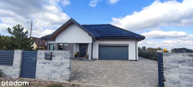 Nowoczesny dom z garażem i dużym ogrodem