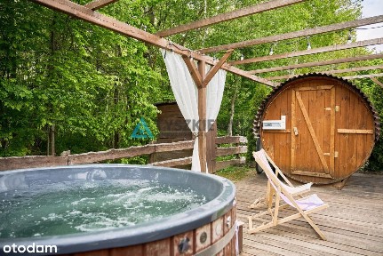 Atrakcyjne siedlisko z dwoma domkami nad jeziorem!