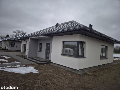 Nowe domy parterowe z podwójnym garażem