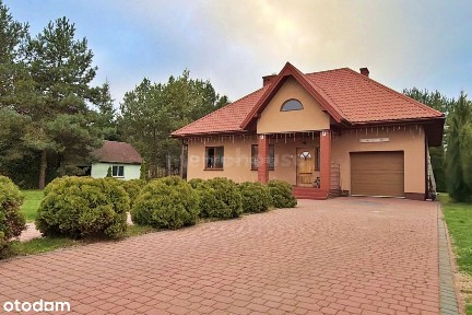 Dom w Rzekuniu na dużej działce ze stawem.