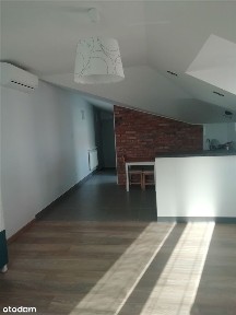 Małe mieszkanie dla singla w stylu loftowym