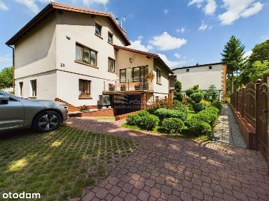 Komfortowy dom z pięknym ogrodem