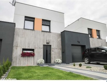Nowoczesny dom szeregowy 96,69 m² z garażem i ogrodem- pełne media