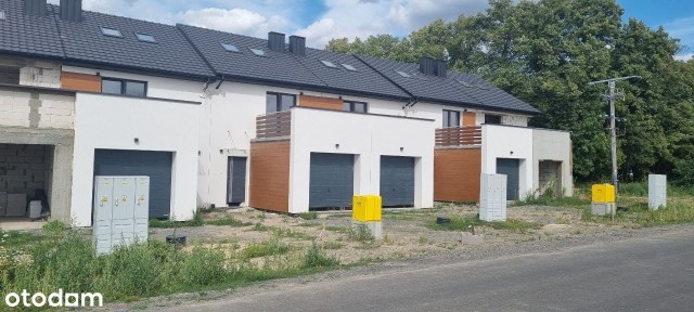 Dom w zabudowie szeregowej Obora ul. Poziomkowej