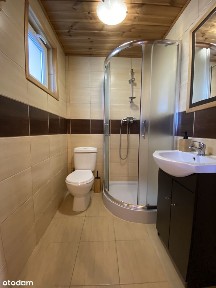 Sprzedam działkę z dwoma domkami drewnianymi