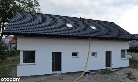 Dom w zabudowie bliźniaczej w centrum.