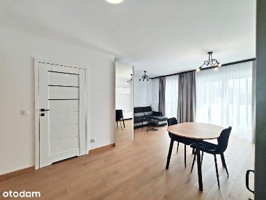Nowy apartament z balkonem oraz garażem