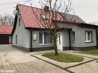 Przestronny dom na sprzedaż z ogrodem i garażem