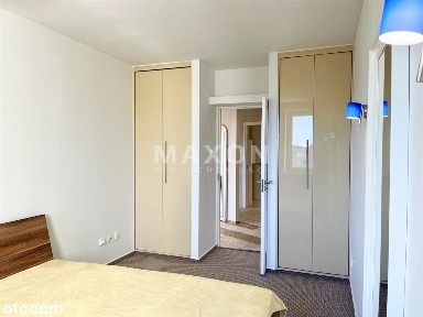 3 pokoje w nowoczesnym apartamentowcu