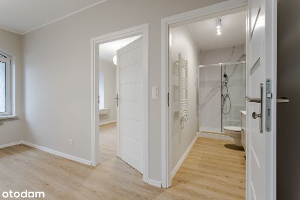 Nowe mieszkanie z ogródkiem i miejscem w hali garażowej