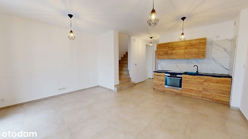 Dwupoziomowy apartament z ogródkiem w Centrum